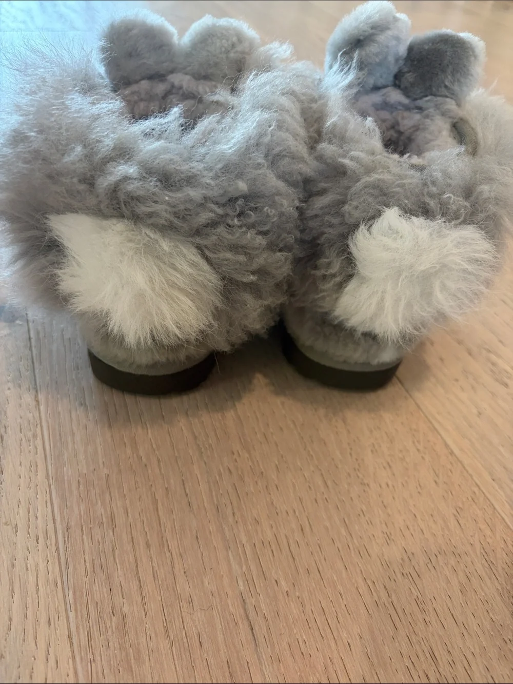 UGG Kids Gray Sheepskin Pom-Pom Slippers with White Accents